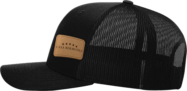 Side-facing patch — shown with the Casa Bermudez logo — your logo goes in its place